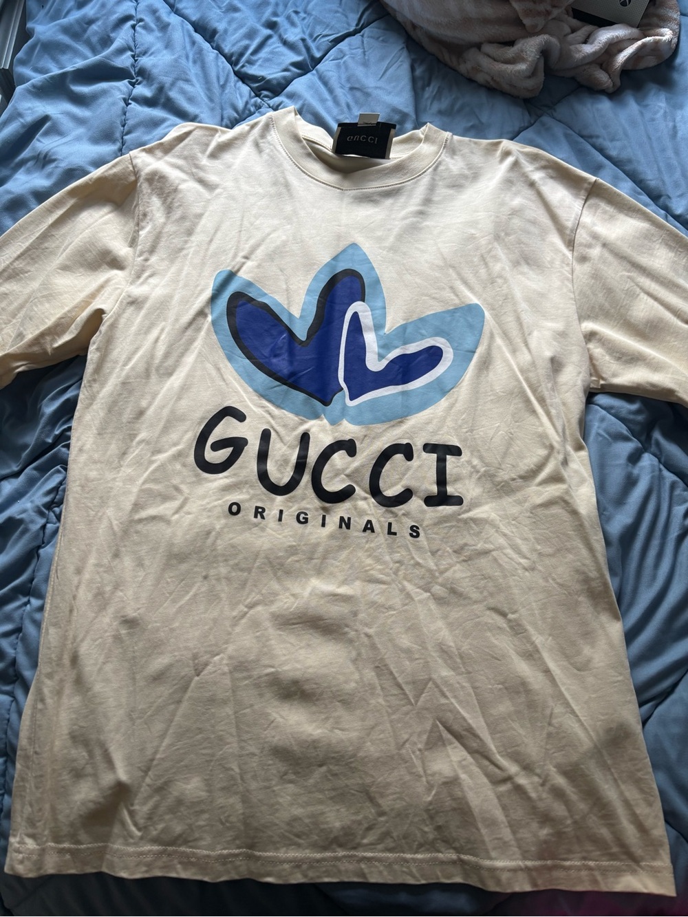 Gucci Cream Short-Sleeve Tee with Blue Graphic Logo